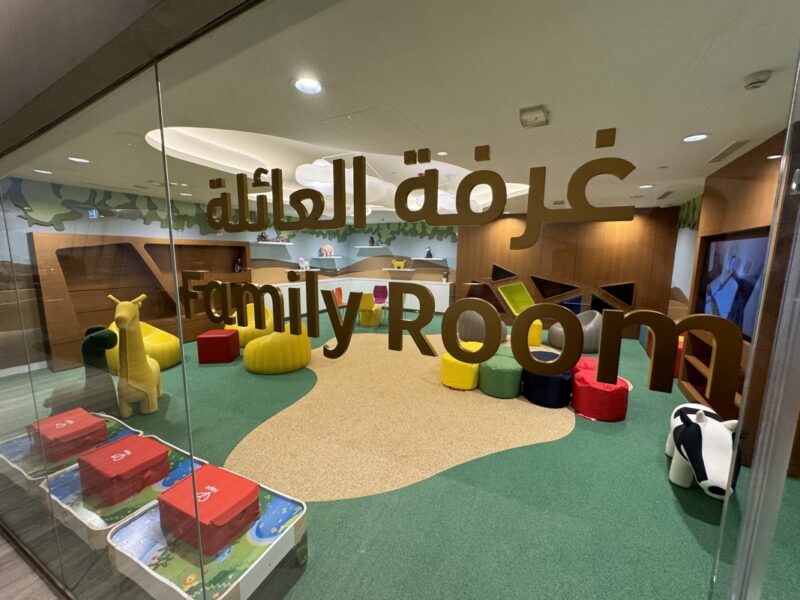 a glass wall with a sign in front of a children's room