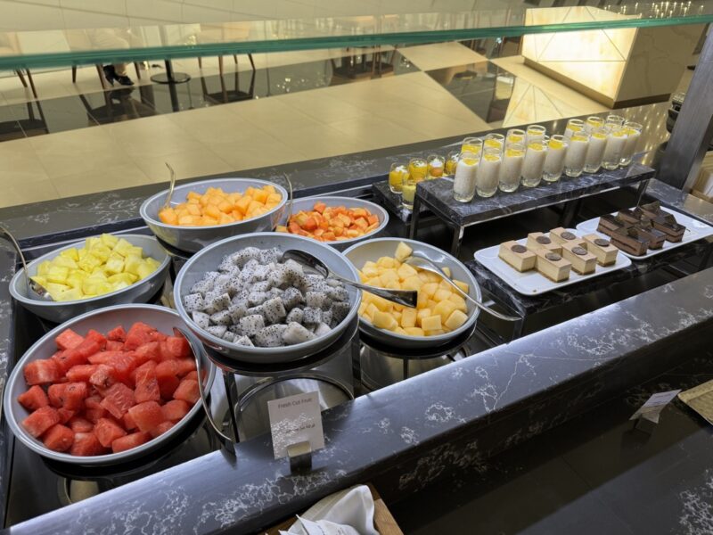 a buffet table with different types of fruit