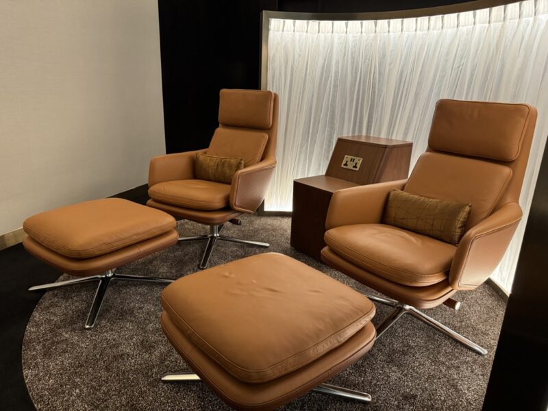 a group of brown chairs in a room